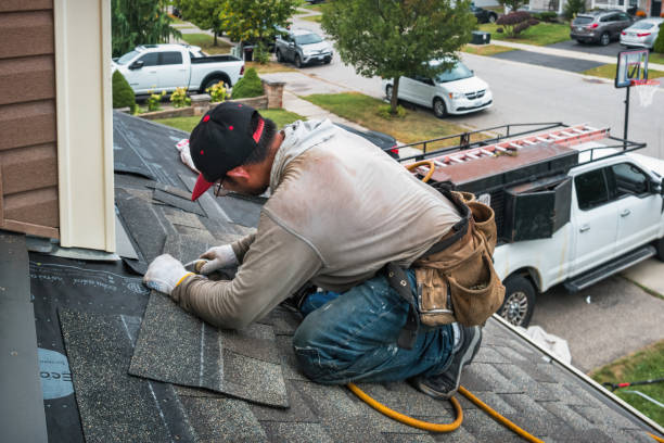 Professional Roofing technician working in Morris, CT